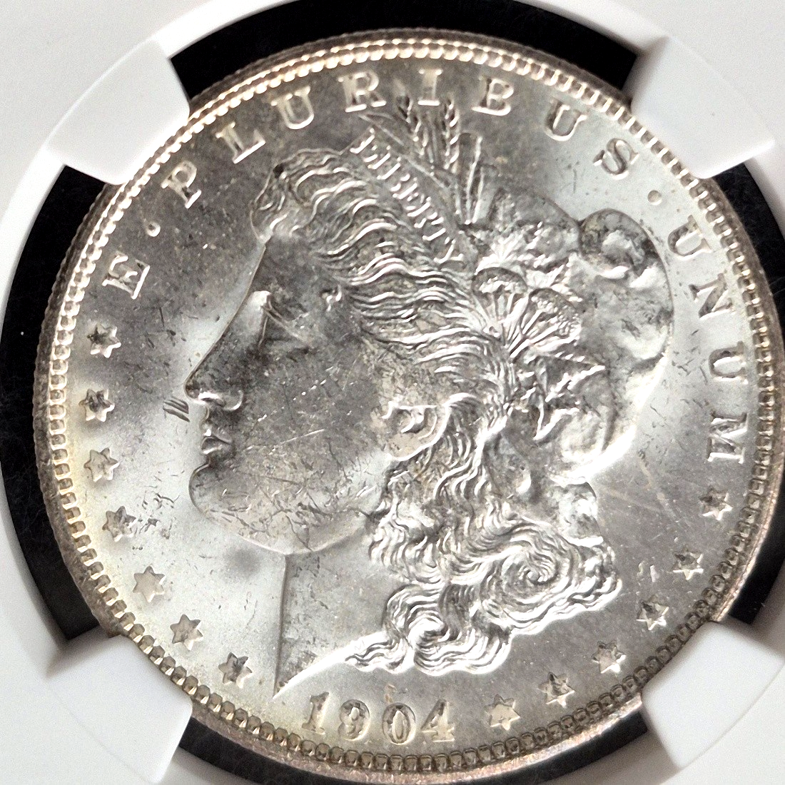 1904-O Morgan Silver Dollar NGC MS63 Rim Toning New Orleans Mint Certified $1