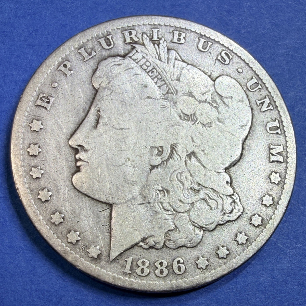 1886-O Morgan Silver Dollar $1 VG New Orleans Mint 90% Silver US Coin