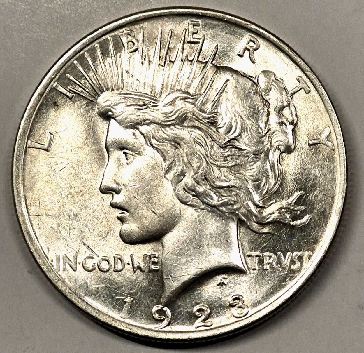 1923 Peace Silver Dollar Well Stuck with Strong AU-MS Feature $1