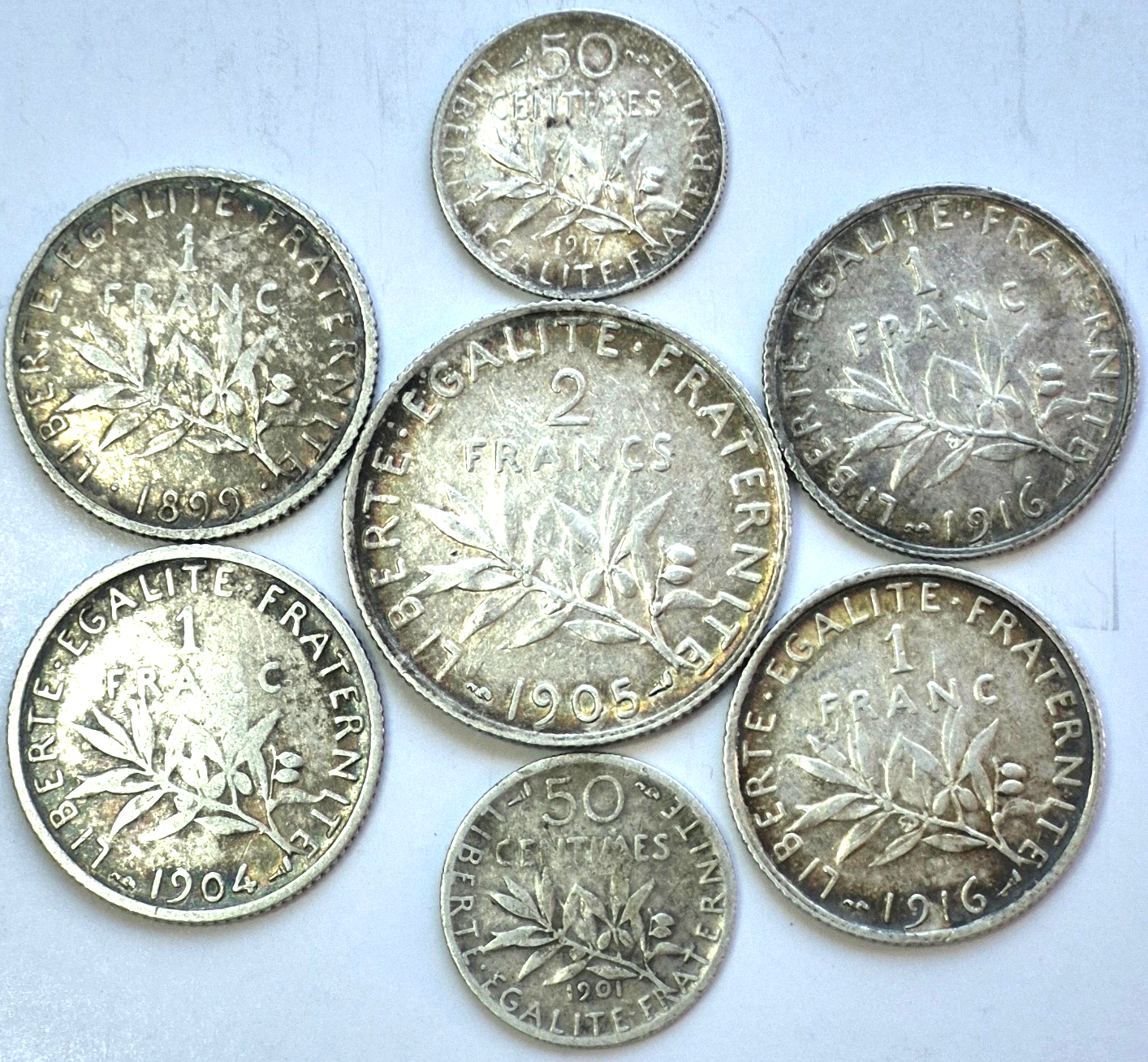 Lot (7) France .835 Silver Coins, (1) 2 Francs (4) 1 Franc (2) 50 Centimes Toned