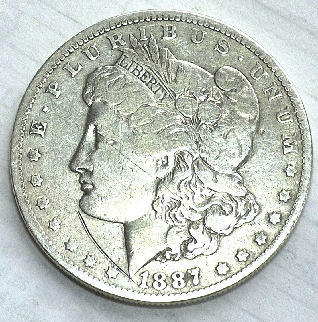 1887-O Morgan 90% Silver Dollar Strong F-VF Features