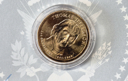 2007 Thomas Jefferson Uncirculated Dollar With The Cetificate Of Official Asset.