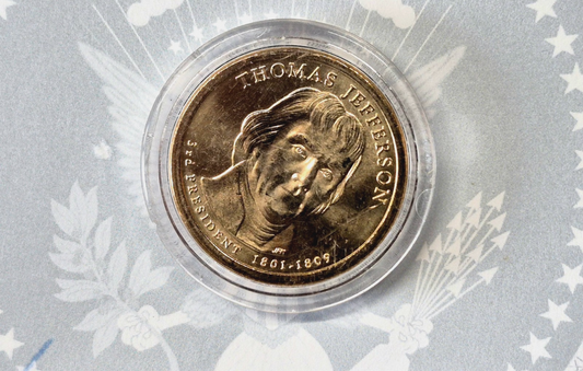 2007 Thomas Jefferson Uncirculated Dollar With The Cetificate Of Official Asset.